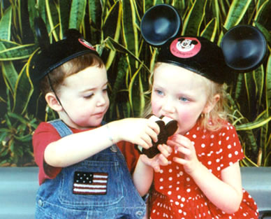Wiley and Autumn share a Mickey ice cream sandwich