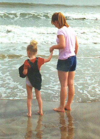 Autumn and her Aunt Colleen wading in the ocean